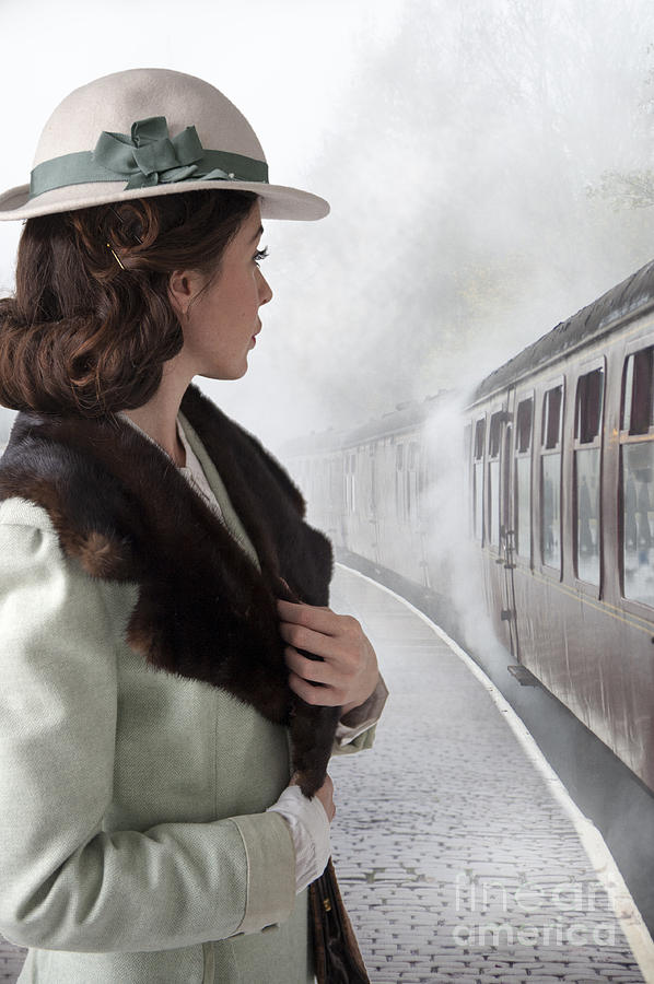 3-1940s-woman-on-a-railway-platform-with-steam-train-lee-avison.jpg