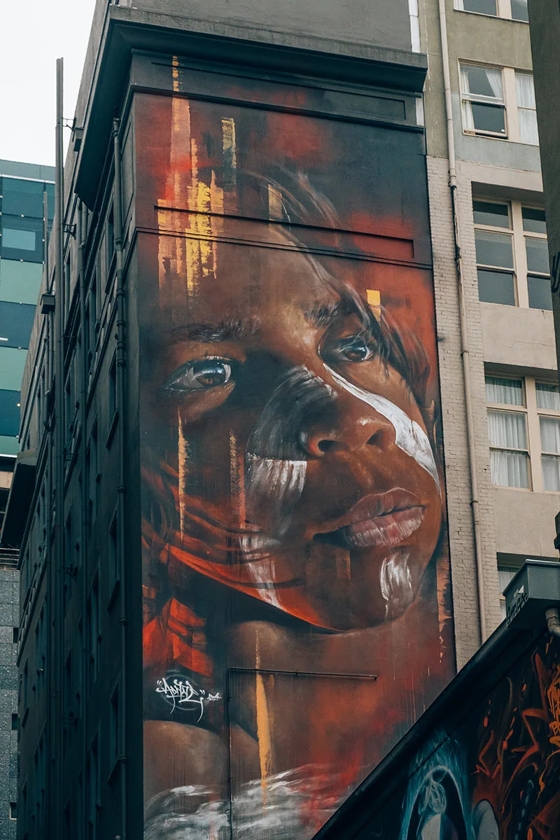 Melbourne-Street-Art-Map-Hosier-Lane-Aborginal-Boy-Mural.jpg.webp